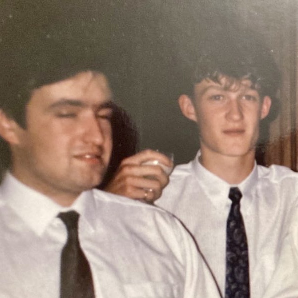 young man getting his hair coloured